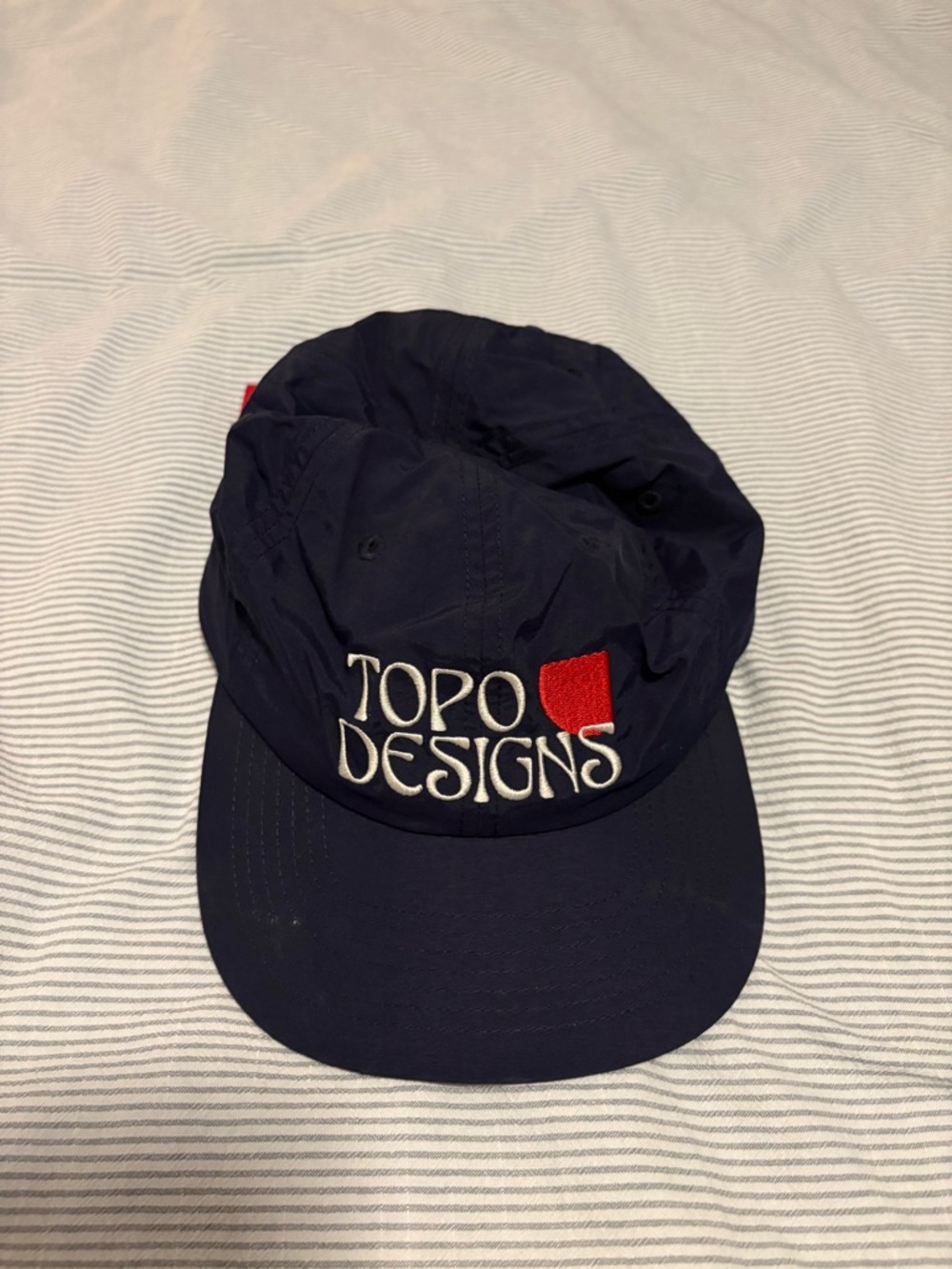 Topo Designs Navy Cap with Red Patch Logo